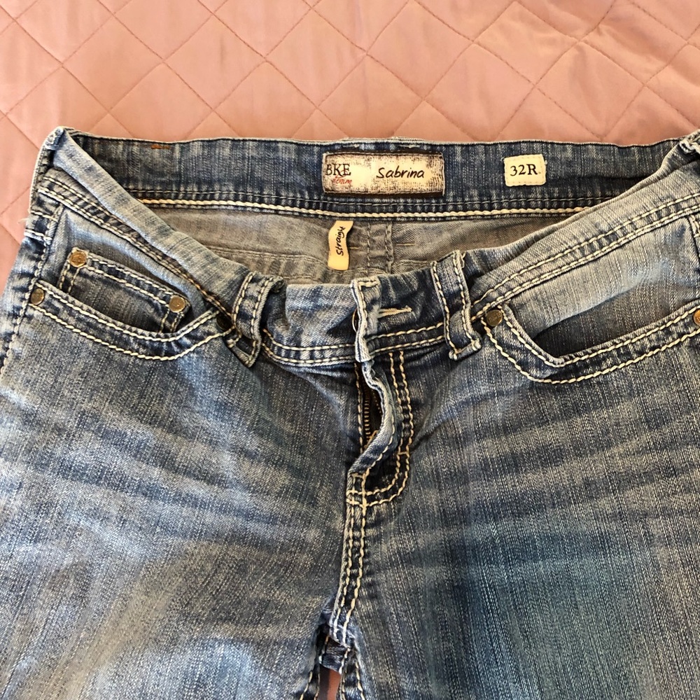 Buckle straight leg jeans